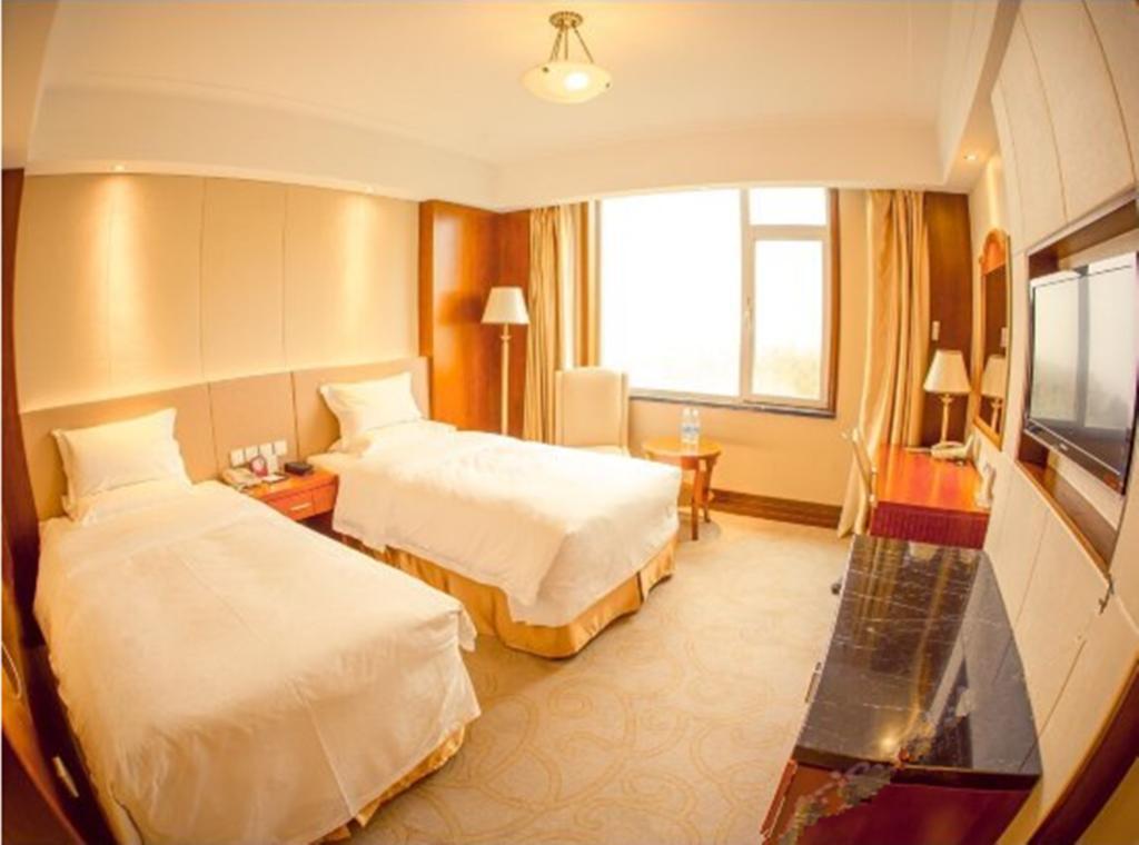 Weihai Golden Bay International Hotel Esterno foto